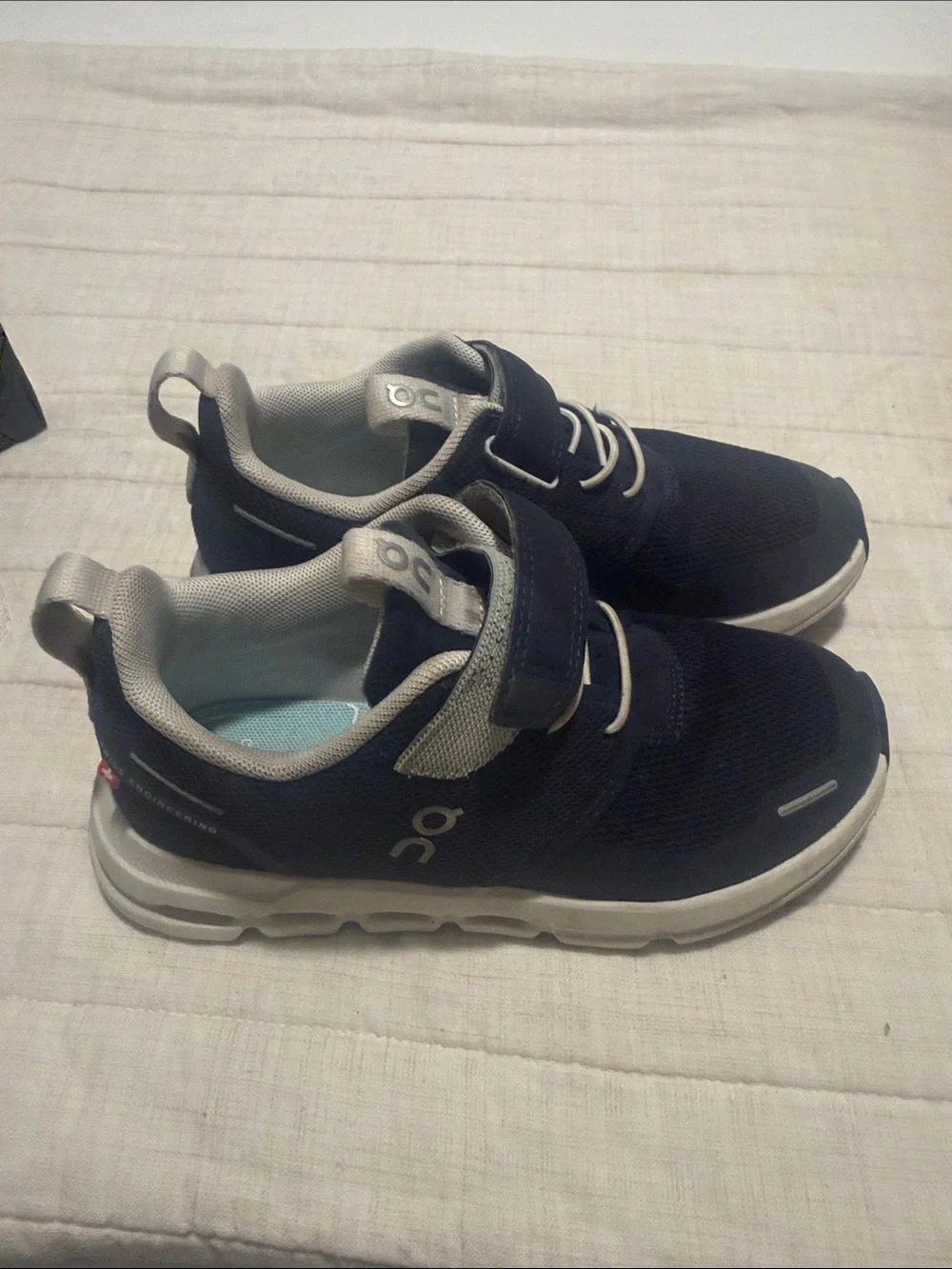 On Running Kids Navy and White Sneakers with Gray Accents